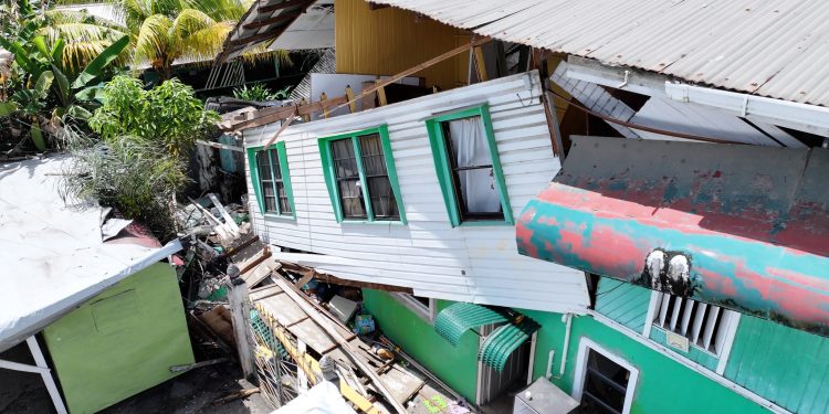 Realtor injured in massive explosion, wife smelled gas