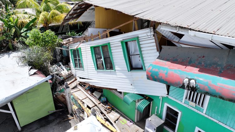 Realtor injured in massive explosion; wife smelled gas