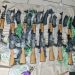 10 AK-47 assault rifles found on Corentyne public road; one arrested, two vehicles held