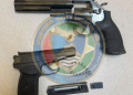 Russian-made handgun seized, two arrested