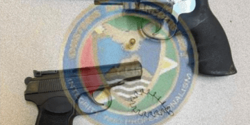 Russian-made handgun seized, two arrested