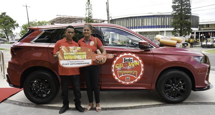 Banks DIH Ltd hands over grand prize in “Crown the Road” promotion