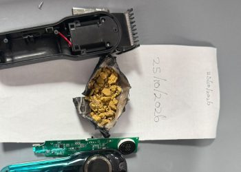 U.S.-bound Americans caught with raw gold in hair-cutting tool – police